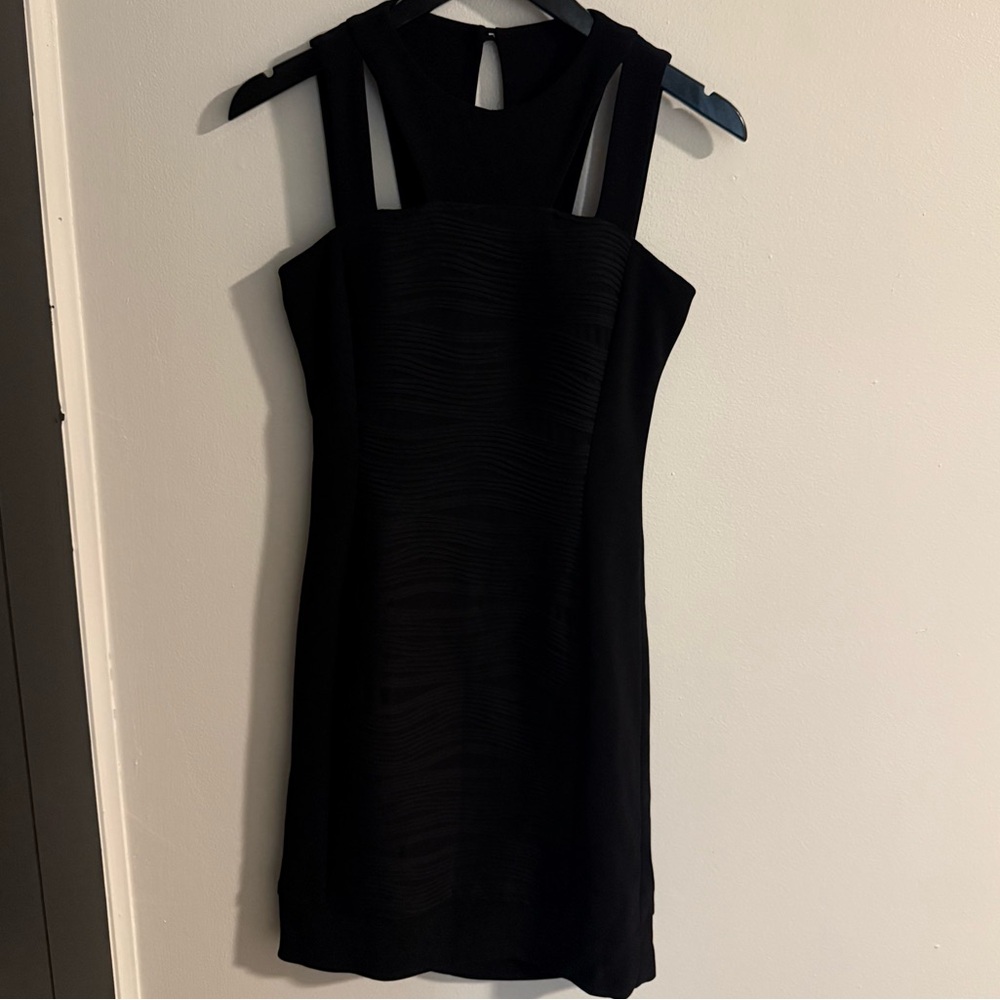 Elegant Black Sleeveless Dress with Neckline Cut-Outs and Ruching